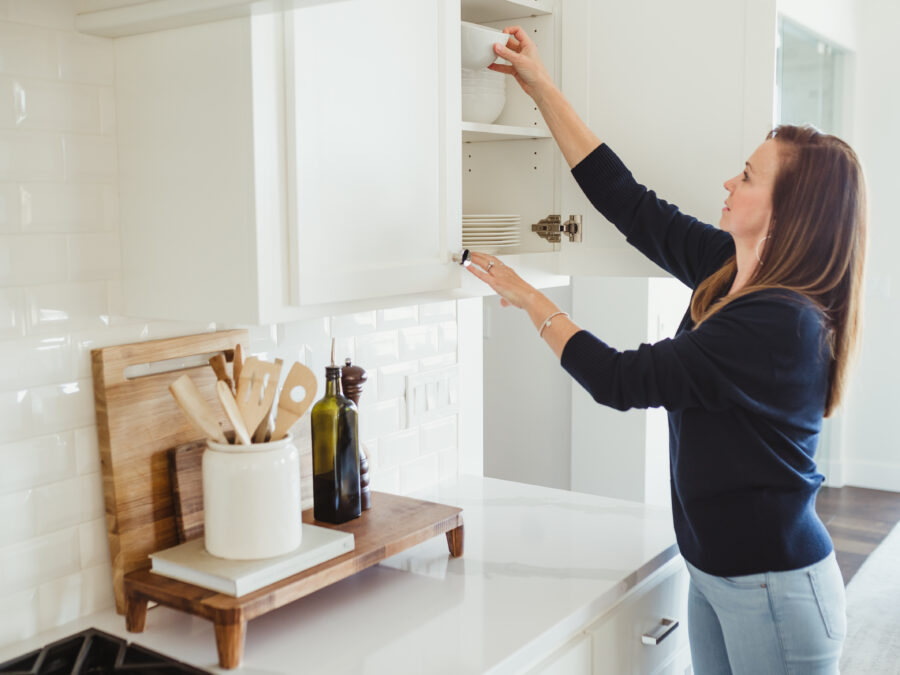 White kitchen with white backsplash organized by 2B Organized Sacramento.